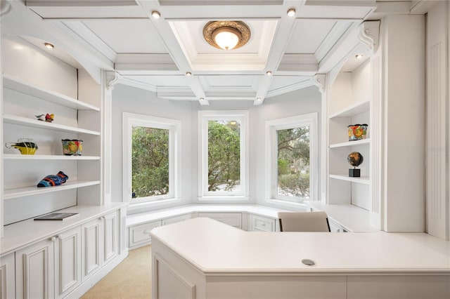 home office with coffered ceiling, beam ceiling, light carpet, and crown molding