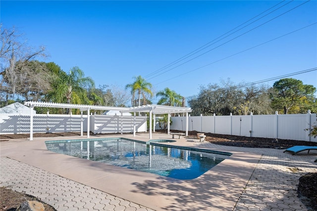 view of swimming pool with a patio, a jacuzzi, and a pergola