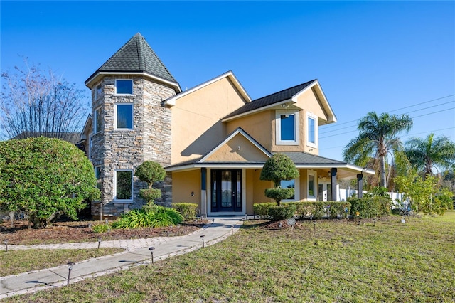 view of front of house featuring a front lawn and a porch