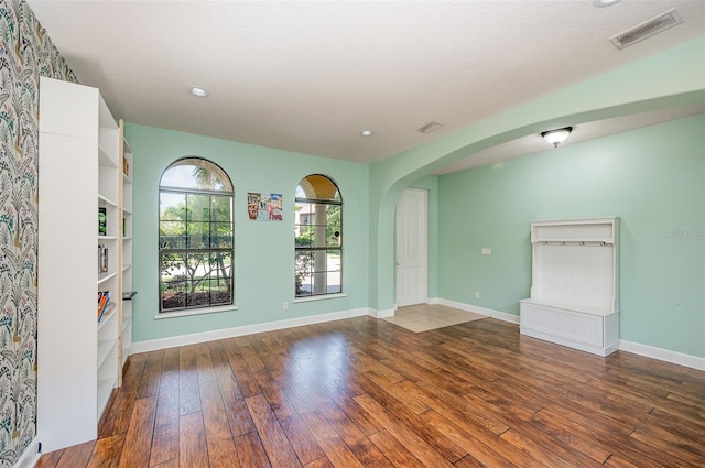 spare room with hardwood / wood-style flooring