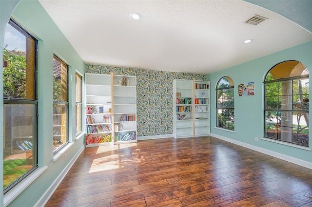 interior space with dark hardwood / wood-style flooring