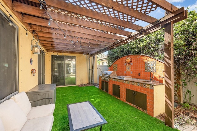 view of patio / terrace with a grill, area for grilling, sink, and a pergola