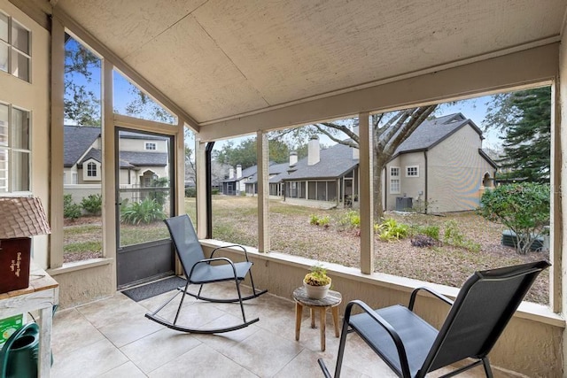 sunroom with vaulted ceiling