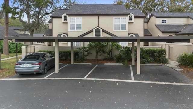 view of car parking featuring a carport