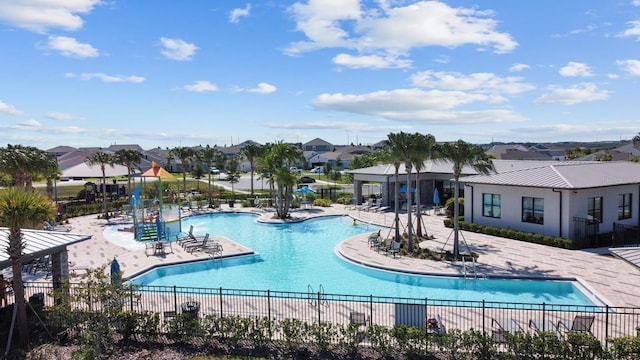 view of swimming pool featuring a patio area