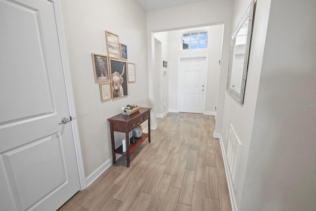 hallway featuring light hardwood / wood-style floors