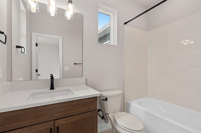 full bathroom with vanity, tub / shower combination, and toilet