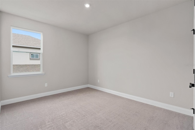 empty room featuring carpet