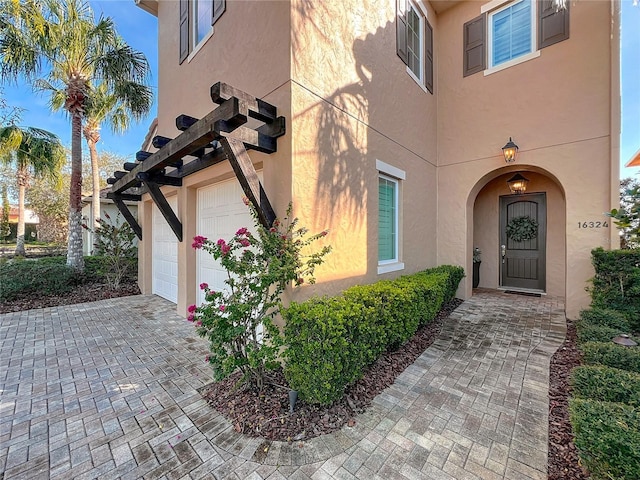 property entrance with a garage