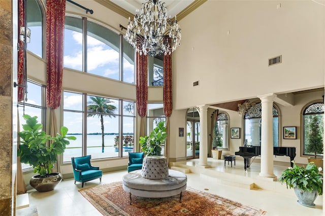 lobby with visible vents and a water view