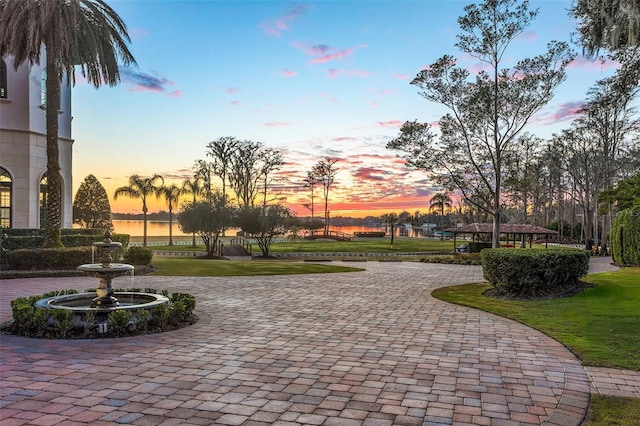 surrounding community featuring a lawn