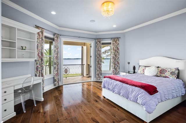 bedroom with ornamental molding, hardwood / wood-style flooring, and access to outside