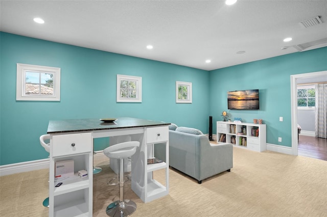 home office featuring recessed lighting, visible vents, baseboards, and carpet flooring