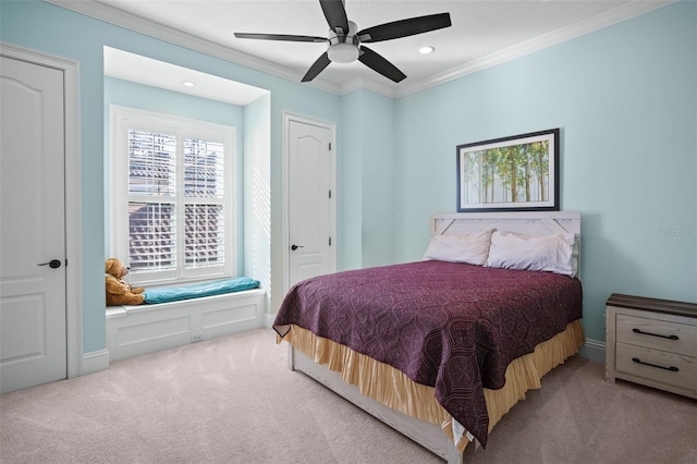 bedroom with a ceiling fan, crown molding, recessed lighting, and carpet floors