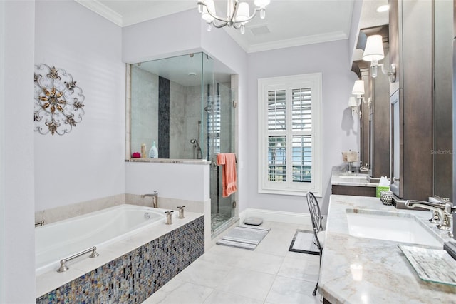 bathroom with a shower stall, a garden tub, ornamental molding, a notable chandelier, and a sink