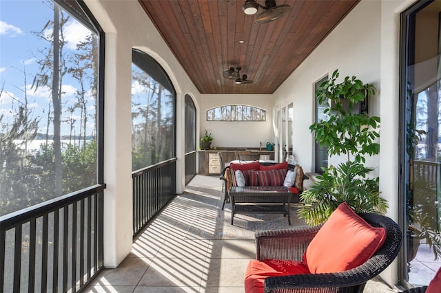 sunroom with wooden ceiling