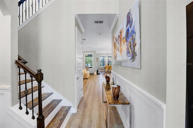 hall with light hardwood / wood-style floors