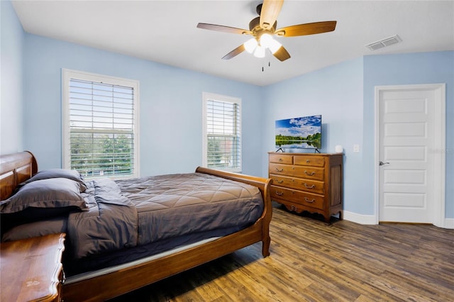 bedroom featuring ceiling fan and wood-type flooring