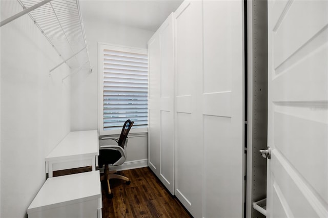 home office featuring dark hardwood / wood-style flooring