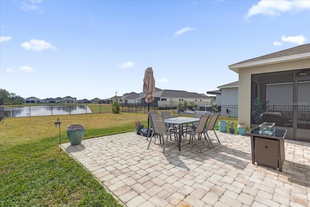 view of patio / terrace with a water view