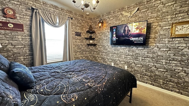 bedroom with carpet and a textured ceiling