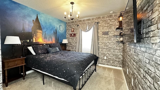 bedroom featuring an inviting chandelier, carpet floors, and a textured ceiling