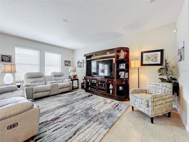 living room with a textured ceiling