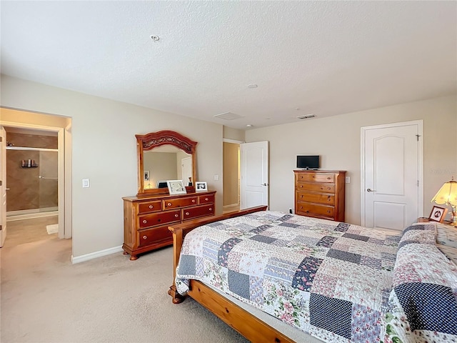 carpeted bedroom with a textured ceiling