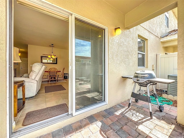 view of patio / terrace featuring cooling unit