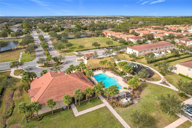 drone / aerial view with a water view