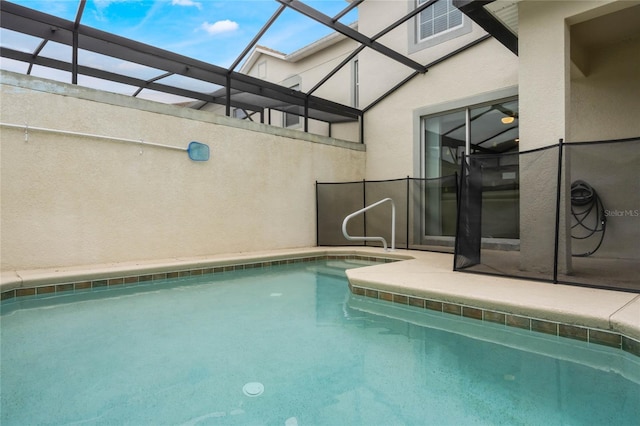 view of pool featuring a lanai