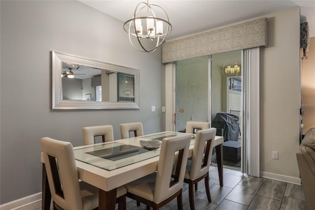 dining room featuring a notable chandelier