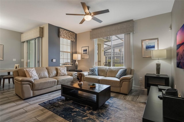 living room featuring ceiling fan