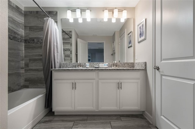 bathroom with vanity and shower / bath combo with shower curtain