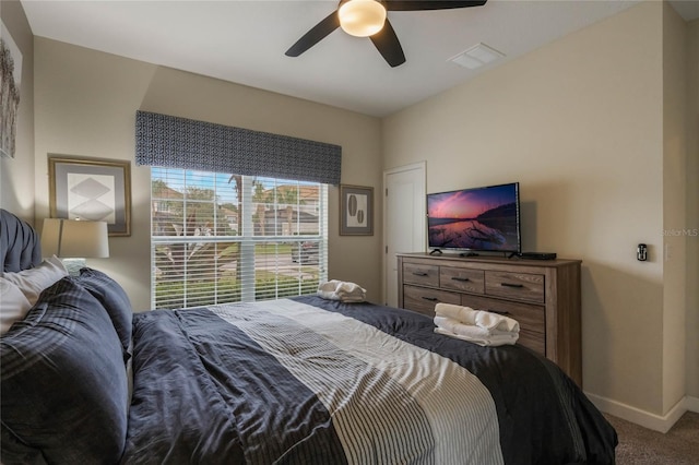 bedroom with ceiling fan and carpet flooring