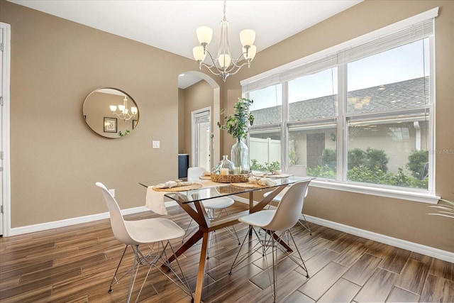 dining room with a notable chandelier