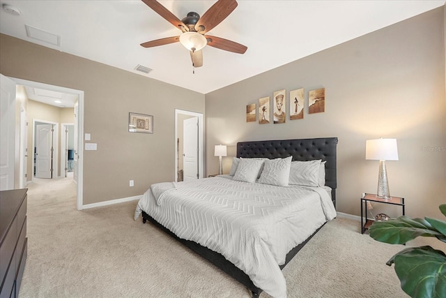 bedroom featuring ceiling fan and light colored carpet