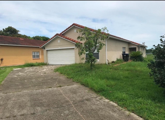 view of property exterior with a garage