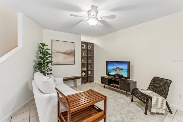 tiled living room featuring lofted ceiling and ceiling fan