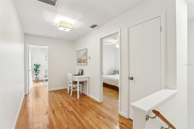 hall featuring light wood-type flooring