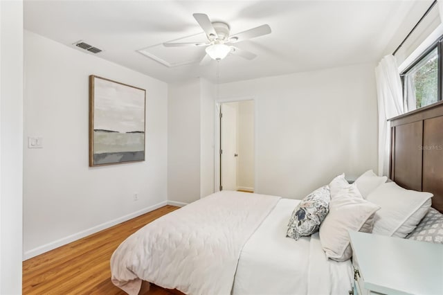 bedroom featuring hardwood / wood-style floors and ceiling fan