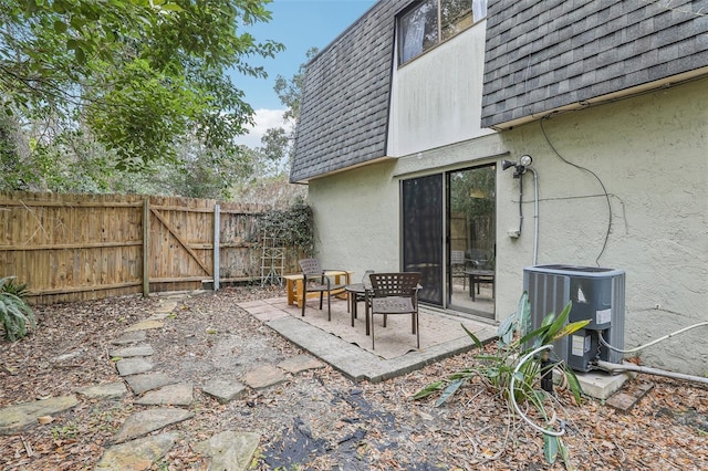 view of patio with central AC unit