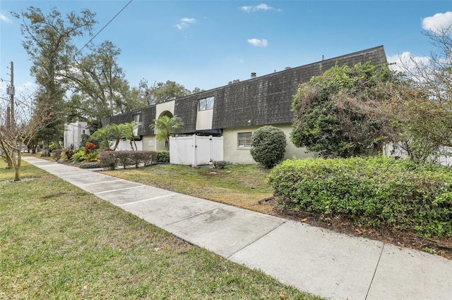 exterior space featuring a yard