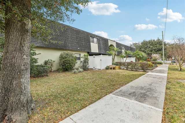 exterior space featuring a lawn