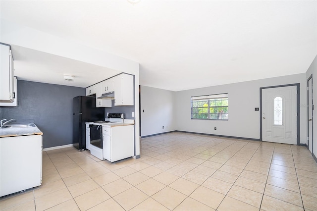 kitchen with white cabinetry, white electric range oven, sink, and light tile patterned floors