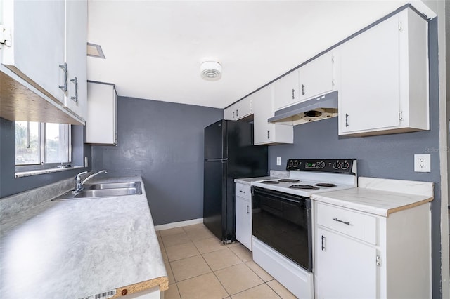 kitchen with black refrigerator, sink, white cabinets, light tile patterned floors, and electric stove