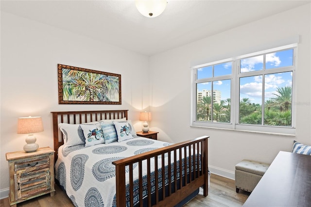 bedroom featuring hardwood / wood-style floors