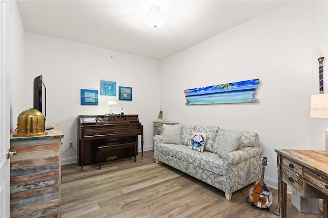 sitting room featuring hardwood / wood-style flooring