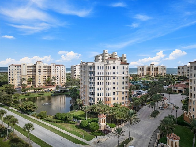 view of building exterior with a water view