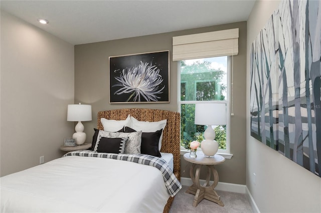 bedroom featuring carpet